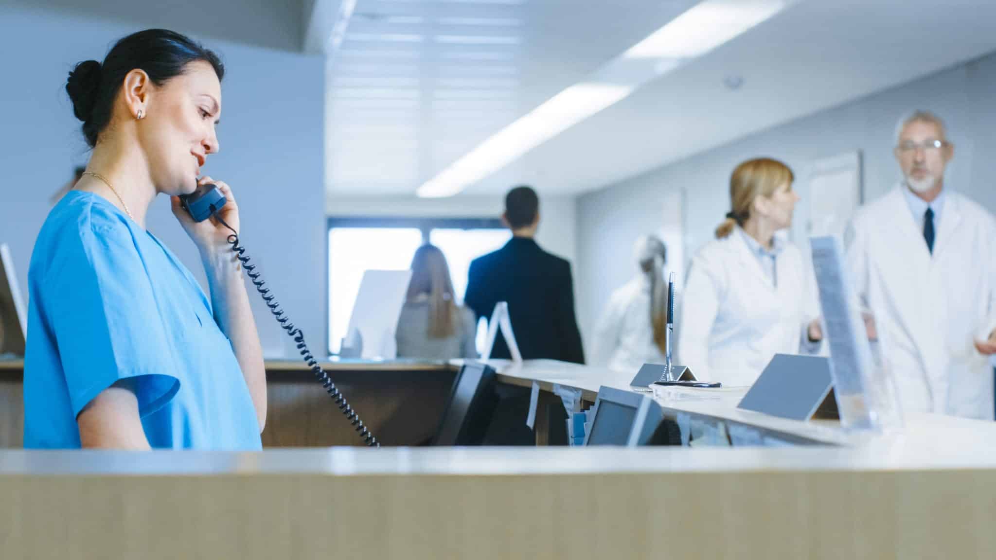 Nurse talking on phone in hospital